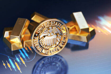 A gold coin with the seal of the United States Federal Reserve